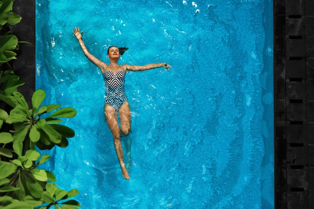 Woman In Pool Water